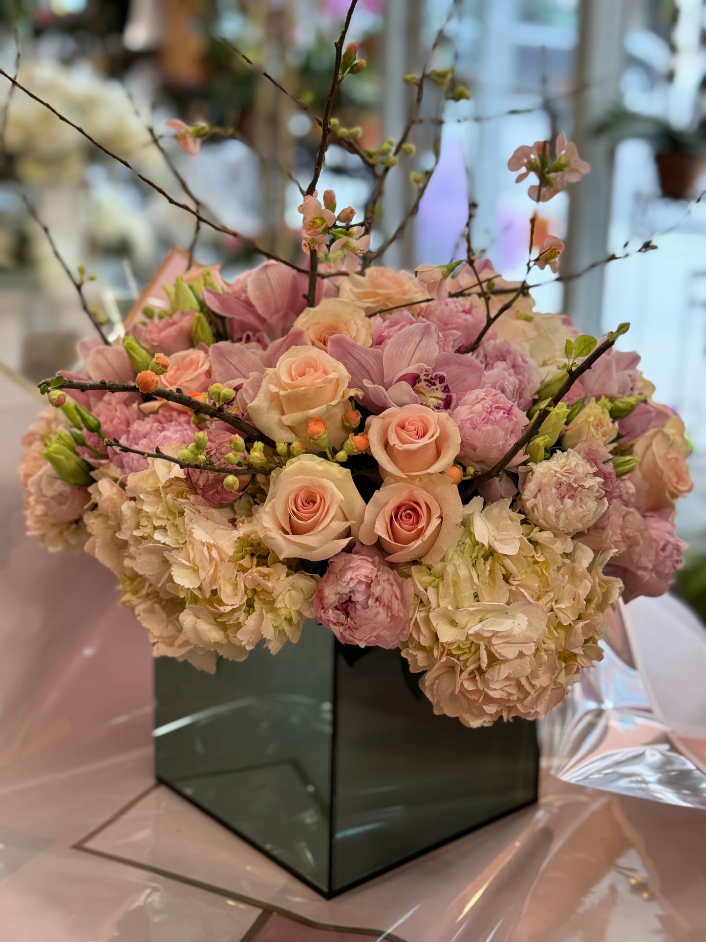 
                    
                      Bold pink hydrangea peony lily and orchid statement arrangement – Jerome Florists NYC
                    
                  