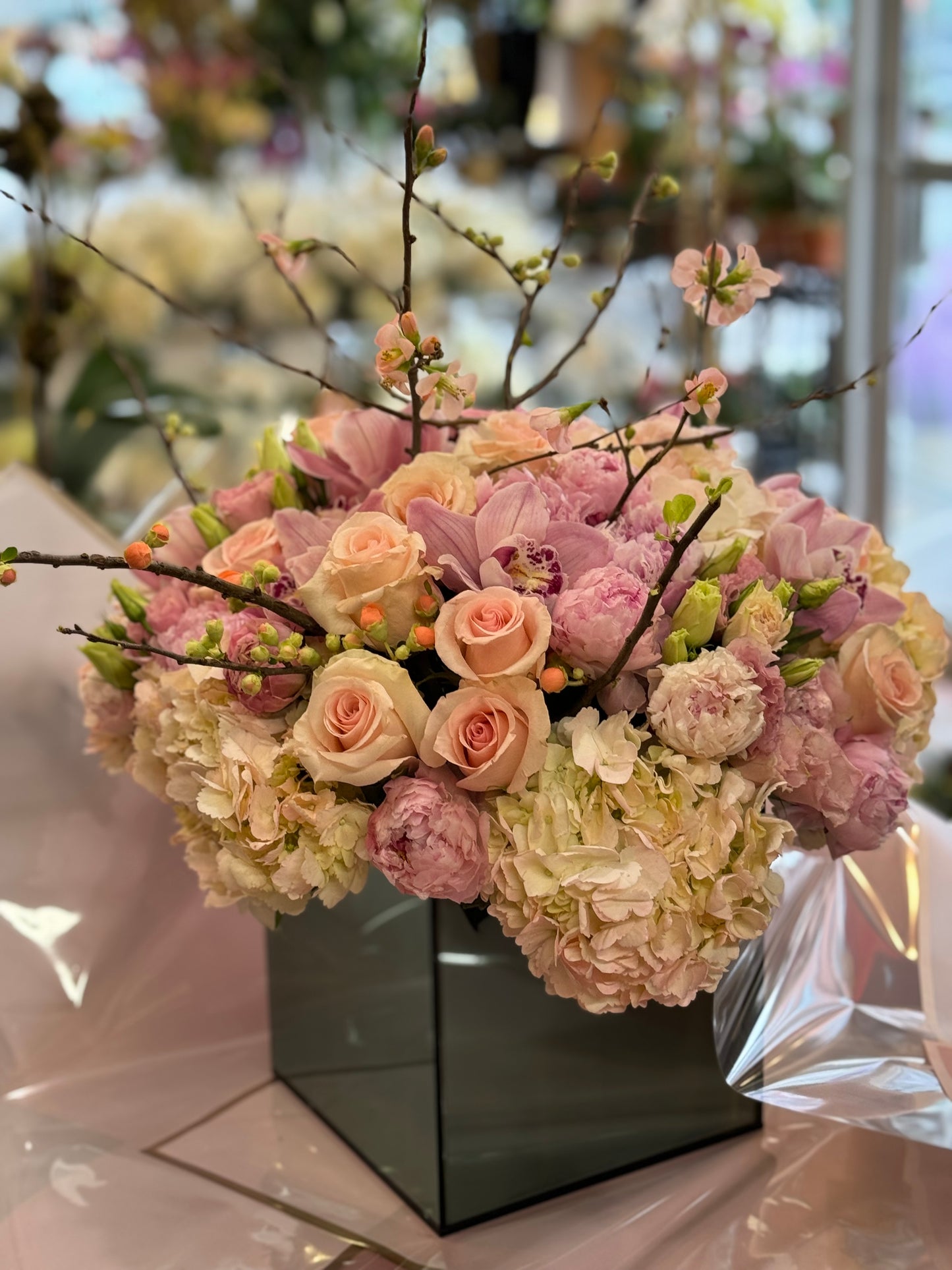
                    
                      Bold pink hydrangea peony lily and orchid statement arrangement – Jerome Florists NYC
                    
                  