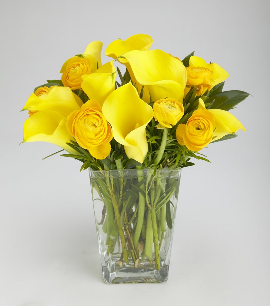 Bright yellow ranunculus and calla lily cheerful arrangement – Jerome Florists NYC